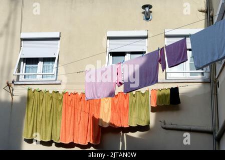 Towels on clotheslines Stock Photo