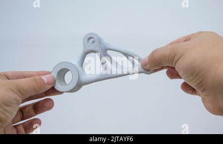 Person holding plastic model printed on powder 3d printer from ...