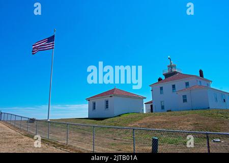 Watch Hill lighthouse in Westerly, Rhode Island on a clear day with a bright blue sky -07 Stock Photo
