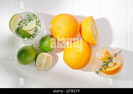 Healthy summer cocktails, mocktails. Set of different citrus lemonades mojitos, with lime, orange, diet detox drinks Stock Photo