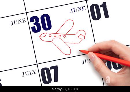 30th day of June. A hand drawing outline of airplane on calendar date 30 June. The date of flight on plane. Travel, business trips. Summer month. Day Stock Photo