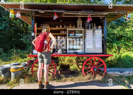 Sales cart with cold drinks, coffee machine and homemade jams. Purchase on a basis of trust. Self-service plan car with complete offer from the country: jam, honey, dairy products in the refrigerator, coffee machine and of course waste separation. Ambt Delden, Netherlands Stock Photo