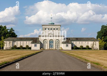 Royal Air Force Memorial front entrance in summer with blue sky and white clouds Stock Photo