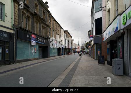 Bangor High Street is in the city of Bangor in Gwynedd, North Wales. It was recently noted for having nearly 50 empty stores. Stock Photo