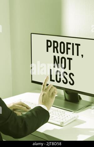 Text showing inspiration Profit Not Loss. Business approach Just revenues good economic strategy successful finances Businessman in suit holding Stock Photo