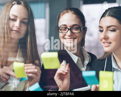brainstorming team developing successful strategy Stock Photo