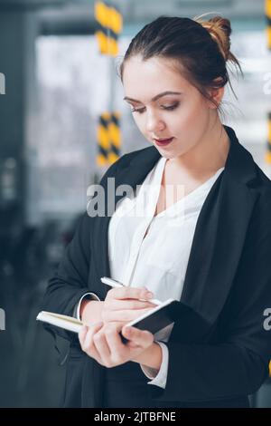 company employee business matters intern notes Stock Photo