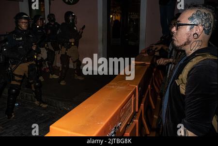 San Juan, Puerto Rico. 27th Aug, 2022. San Juan SWAT face LUMA Energy protesters near La Fortaleza on August 27, 2022 in San Juan, Puerto Rico. (Photo by Collin Mayfield/Sipa USA) Credit: Sipa USA/Alamy Live News Stock Photo