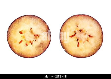Close-up of Cut halves of blueberries isolated on white background Stock Photo