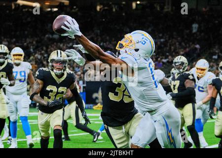 Los Angeles Chargers wide receiver Jason Moore Jr. (11) runs past New  Orleans Saints cornerback Vincent