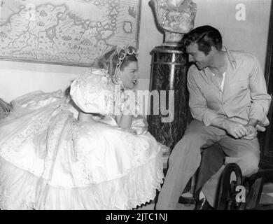 JUDY GARLAND and GENE KELLY on set candid during filming of THE PIRATE 1948 director VINCENTE MINNELLI play S.N. Behrman songs by Cole Porter costume design Tom Keogh producer Arthur Freed Metro Goldwyn Mayer Stock Photo