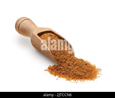 Wooden scoop full of palm sugar isolated on white background Stock Photo