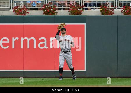 San Francisco Giants' Luis Gonzalez (51) scores a run behind Arizona  Diamondbacks catcher Jose Herrera on an error by infielder Sergio Alcantara  in the first inning during a baseball game, Wednesday, July