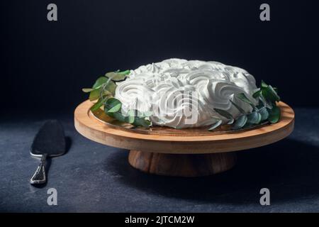 close up of zephyr cake on wooden stand Stock Photo