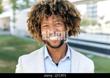 beautiful female with curly hair wearing black bra and white male shirt  17156290 Stock Photo at Vecteezy