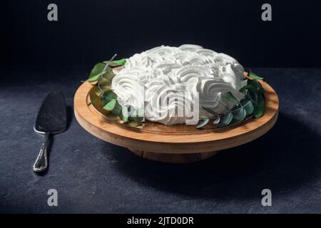 close up of zephyr cake on wooden stand Stock Photo