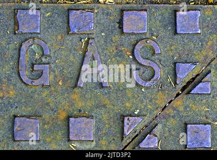 Gas supply ironwork Grid, cast iron embossed with the word gas Stock Photo