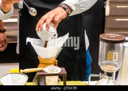 Preparing drinks at a health training event for international coffee day Stock Photo