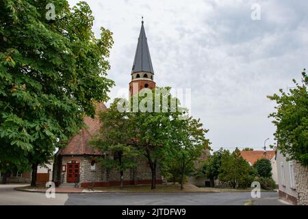 Hungarian village Church with grey steeple Stock Photo