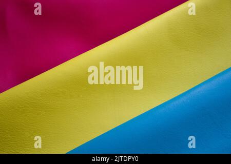 Close up of light blue, yellow and pink soft nappa leather. Stock Photo