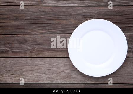 White empty plate on grey background, close up Stock Photo