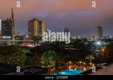 The new Nairobi night skyline. On the foreground is the Serena hotel swimming pool the new Nairobi expressway and the new skyscrapers Stock Photo