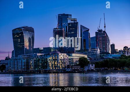 City of London and Thames in stunning dawn light. July 2022 Stock Photo