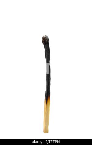 A close up view of a burnt out match stick. Half burnt charred matchstick against a white background Stock Photo