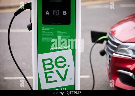 BE.EV public parking bay street ev charging point in Salford Gtr Manchester Stock Photo