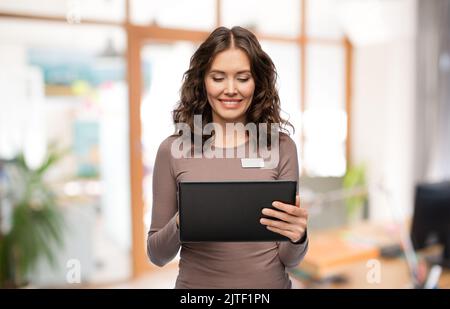happy woman with tablet pc at office Stock Photo
