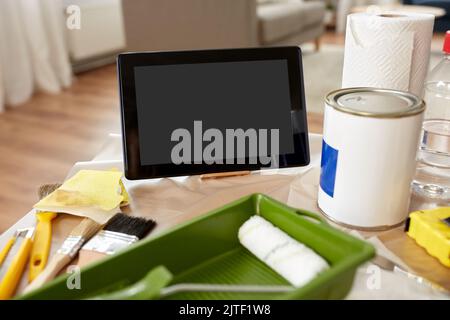 close up of tablet pc and painting tools on table Stock Photo