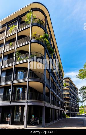 Modern residential buildings Riva, Rhine promenade in Basel city centre, Switzerland. Stock Photo