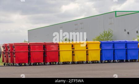 Big Stack of New Colour Coded Plastic Sorting Bins Environment Stock Photo