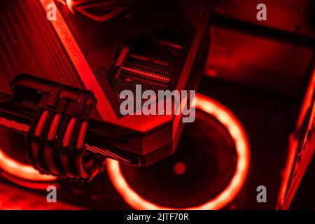Milan, Italy 30 august 2022: A graphics card with a futuristic design. Powerful gaming graphics card for video games and cryptocurrency mining. Dark k Stock Photo