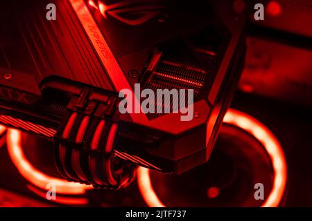 Milan, Italy 30 august 2022: A graphics card with a futuristic design. Powerful gaming graphics card for video games and cryptocurrency mining. Dark k Stock Photo