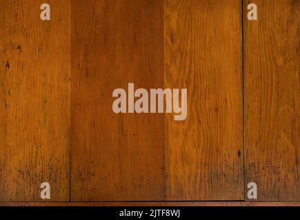 Close-up of worn antique cutting board with knife cut marks Stock Photo