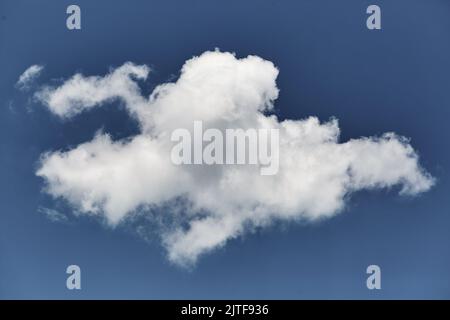 Single white cloud in blue sky Stock Photo