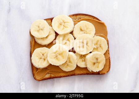 Overhead view of peanut butter and banana toast Stock Photo