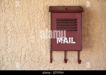 Old mailbox on wall Stock Photo