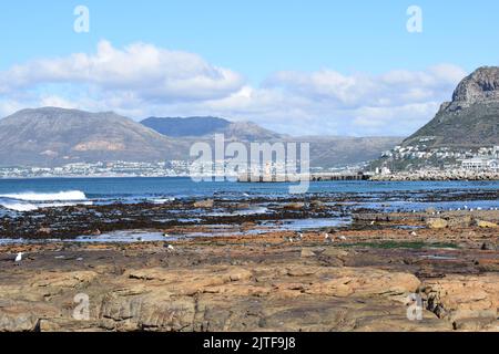 View from Dalebrook Tidal Pool of the ocean and landscape from Kalk Bay to Simon's Town on a mild, clear winters day Stock Photo