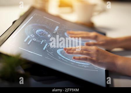 hands on led light tablet at night office Stock Photo
