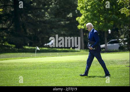 Washington, United States. 30th Aug, 2022. President Joe Biden crosses the South Lawn of the White House in Washington, DC on his way to Wilkes-Barre, Pennsylvania to deliver remarks on his Safer American Plan that would further reduce gun crime on Tuesday, August 30, 2022. Photo by Bonnie Cash/UPI Credit: UPI/Alamy Live News Stock Photo