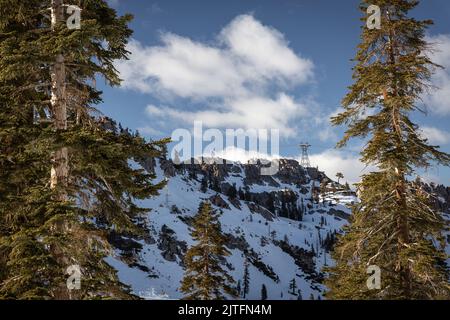 A winter landscape with snow covered mountain at ski resort near lake Tahoe California Stock Photo