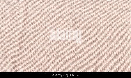 Warm light beige handmade sweater background. Coffee colored knitted background Stock Photo