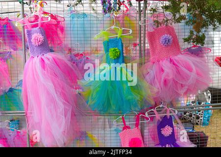 Girls' ballet dresses on display and sale at a arts and craft show at Drummer Boy Park in Brewster, Massachusetts on Cape Cod Stock Photo