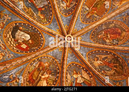 Rheine, NRW, Germany - August 24 2022 Art in the St. Dionysius church. The star-vaulted ceiling of the old sacristy, showing the patron saints of diff Stock Photo