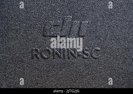 Kostanay Kazakhstan 27.08. 2022.Ronin SC DJI logo gray background, three axis stabilizer Stock Photo