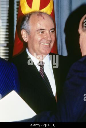 **FILE PHOTO** Mikhail Gorbachev Has Passed Away. President Mikhail Gorbachev of the Soviet Union greets guests at the United States Department of State in Washington, DC prior to meeting US President Ronald Reagan to sign the the Intermediate-Range Nuclear Forces (INF) treaty on December 8, 1987. The agreement eliminated US and Soviet intermediate-and shorter-range nuclear missles and led to the elimination of more nuclear weapons. Credit: Ron Sachs/CNP /MediaPunch Stock Photo