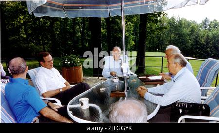 Camp David, Maryland - June 2, 1990 -- United States President George H.W. Bush meets with Union of Soviet Socialist Republics (USSR) President Mikhail Gorbachev and thei key foreign policy advisors at Aspen Lodge, Camp David, Maryland on June 2, 1990. From left: United States Secretary of State James A. Baker III, President Bush, United States National Security Advisor Brent Scowcroft, Union of Soviet Socialist Republics Foreign Minister Eduard Shevardnaze, and President Gorbachev.Credit: White House via CNP/Sipa USA Credit: Sipa USA/Alamy Live News Stock Photo