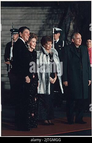 U.S. President Ronald Reagan and First Lady Nancy Reagan welcome USSR General Secretary Mikhail Gorbachev and his wife, Raisa, to the White House for a State Dinner in their honor on December 8, 1987. White House via CNP Stock Photo